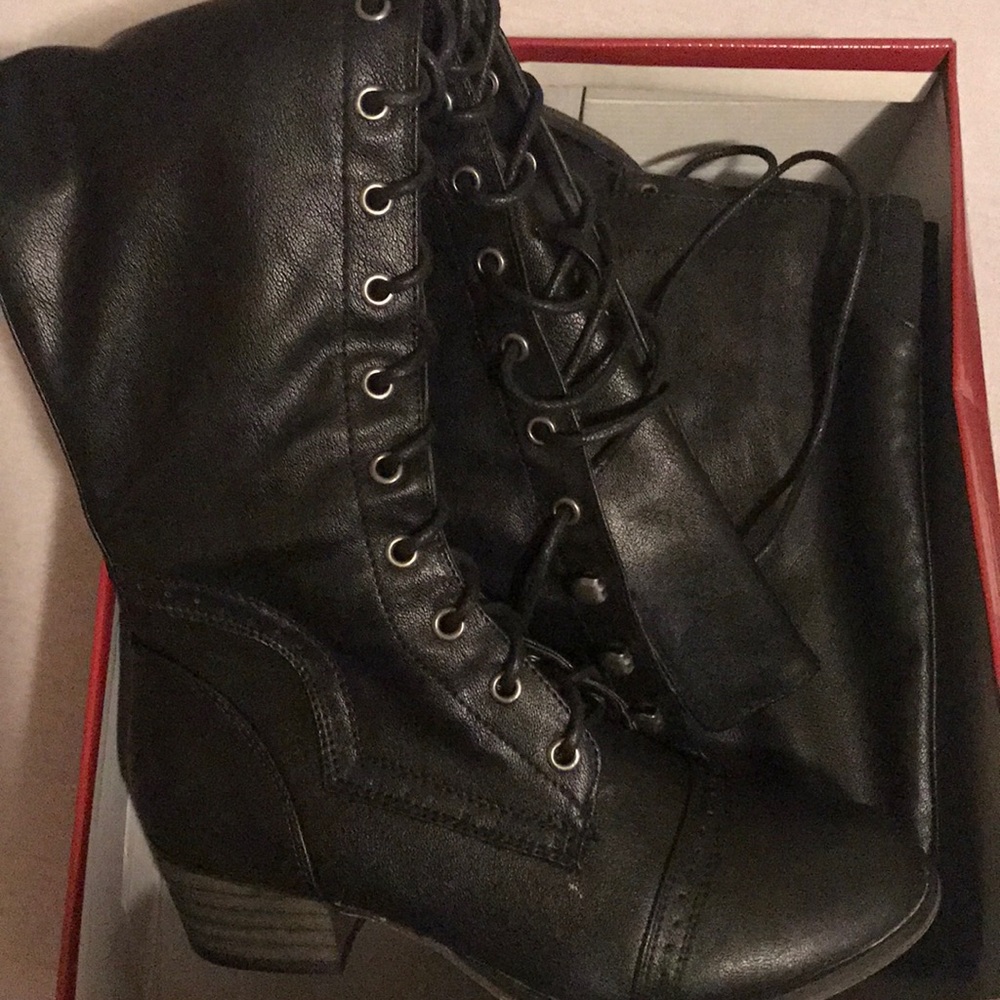 Never worn over the knee lace up boots